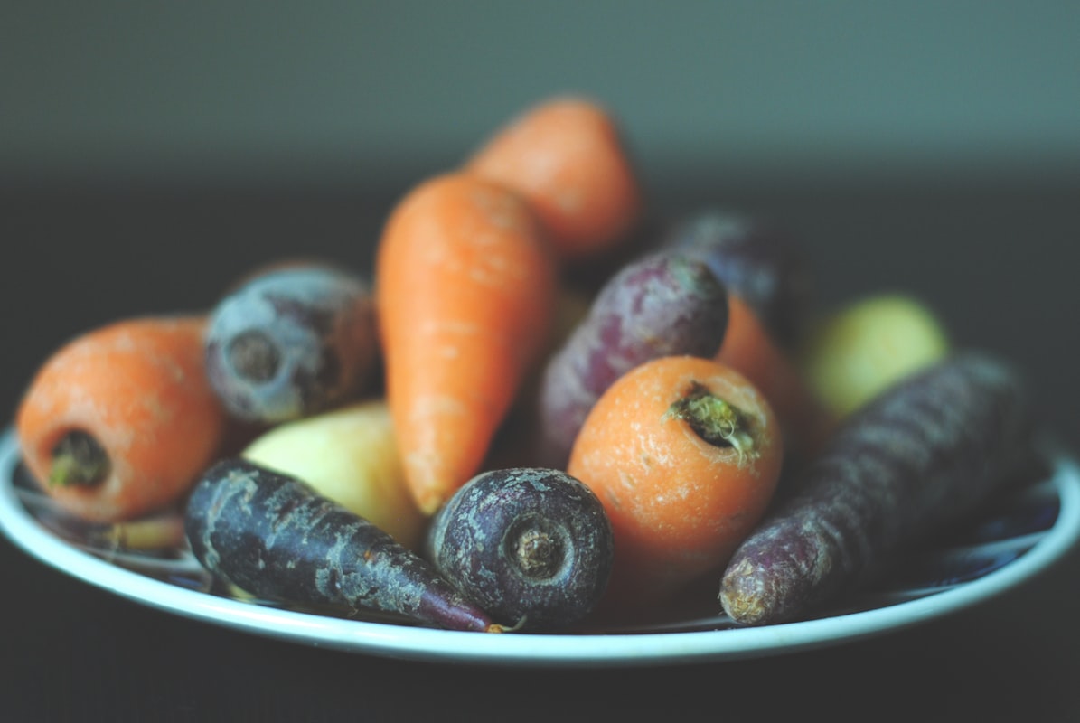 Bright orange carrots and sweet potatoes